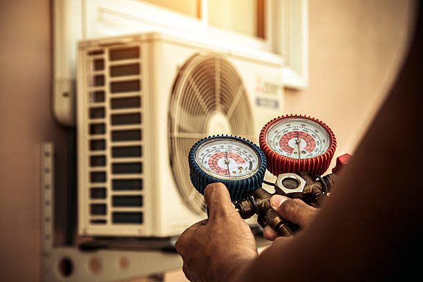 Professional Air Conditioning Service technician working in Tangerine, FL